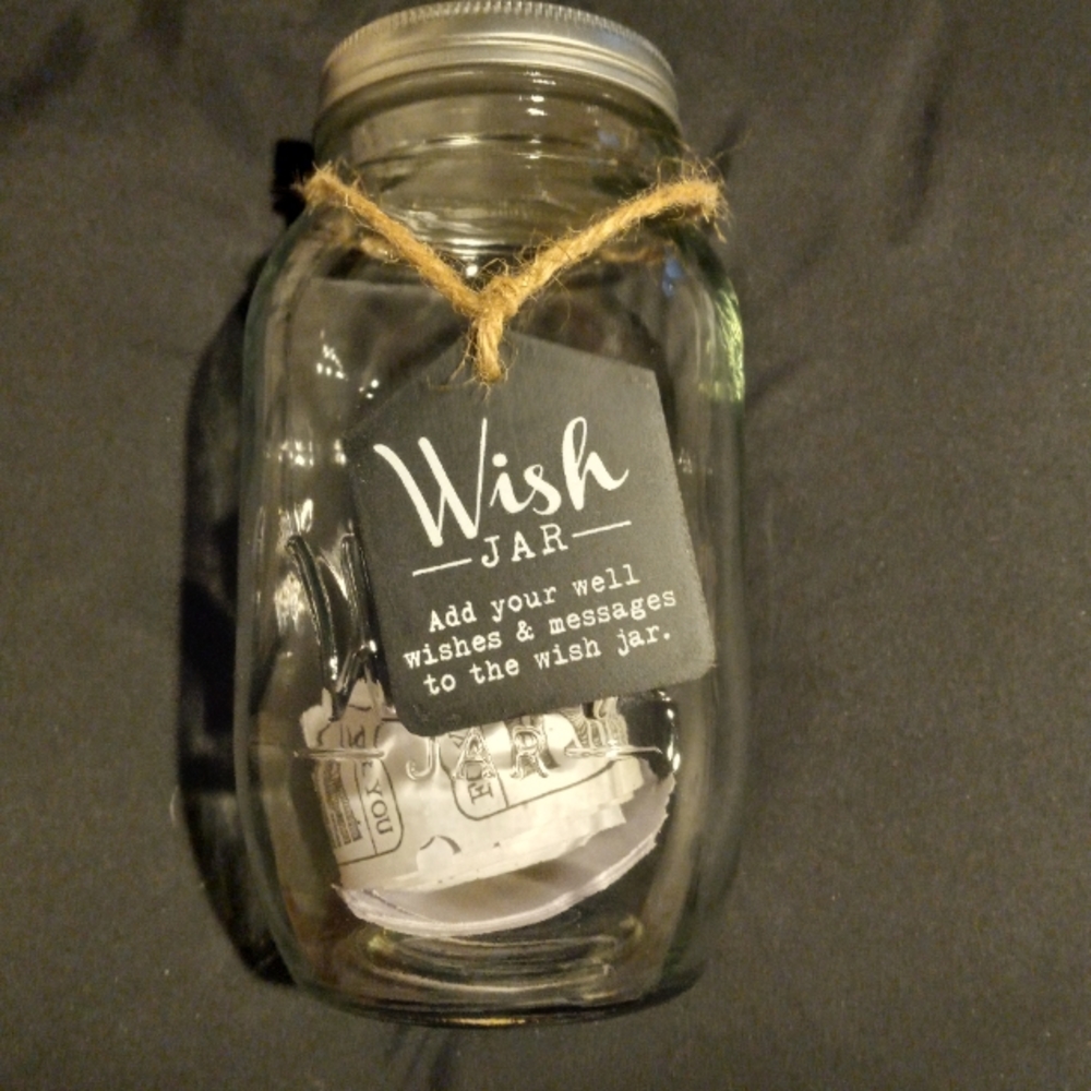Retirement Wish jar with 79 tickets and decorative lid.